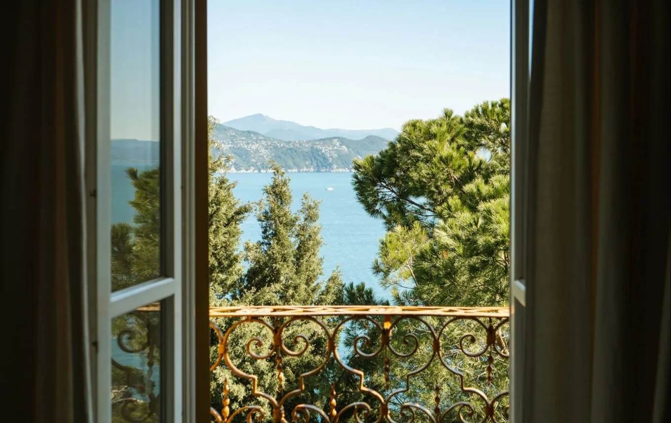 An open window over the sea on the Ligurian coast