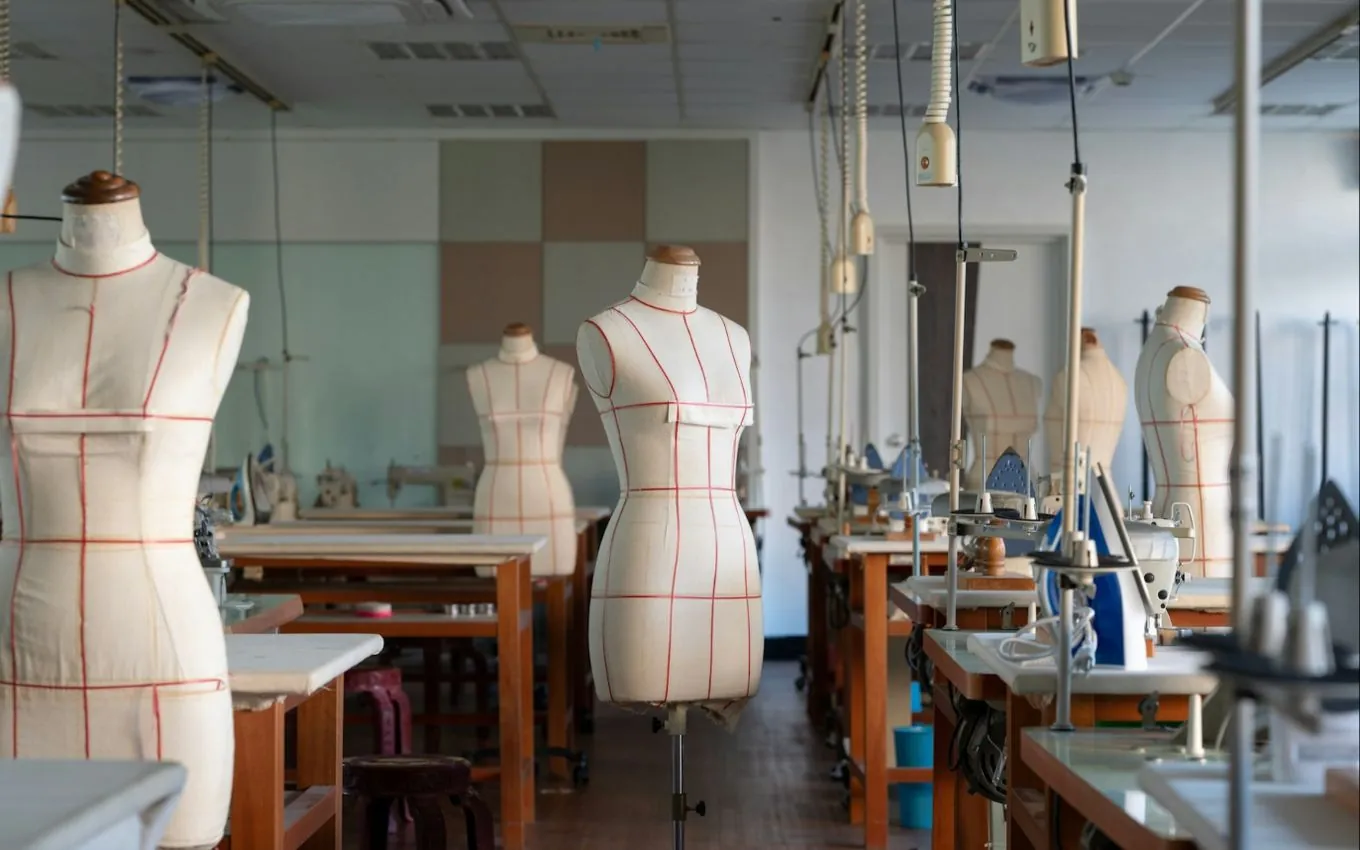 A tailoring workshop with dress forms and sewing machines